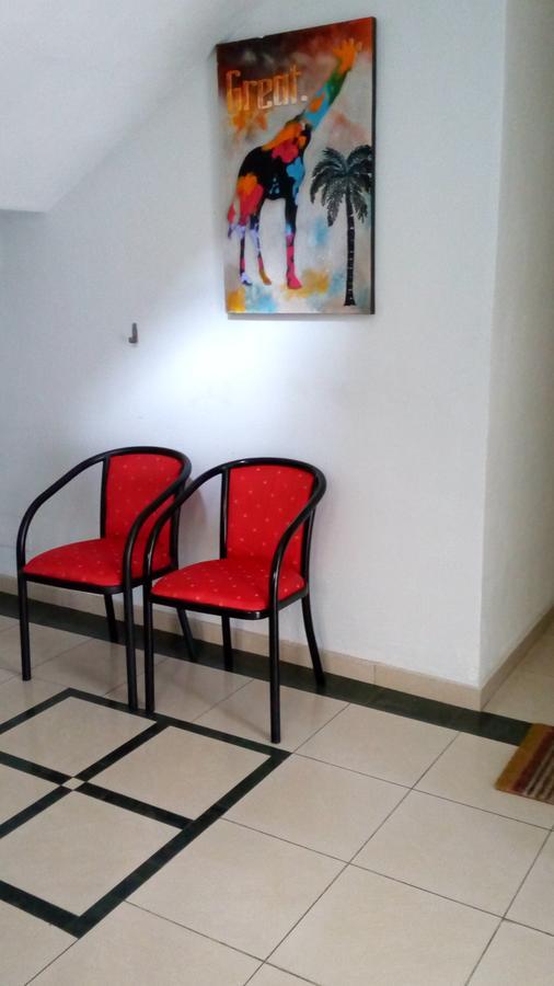 Hotel Djigui Abidjan Bagian luar foto